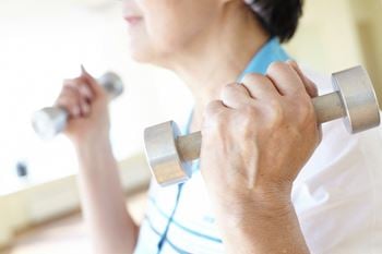 elderly woman working out